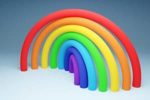 3d-illustration-of-rainbow-round-arch-on-gray-background-portal-of-long-inflatable-colorful-balls-to-the-magical-land